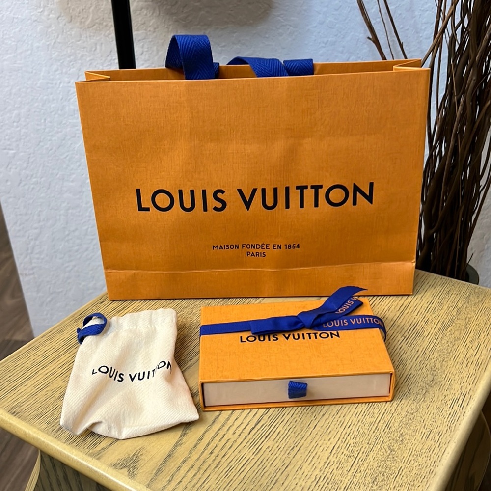 Small Louis Vuitton gift bag, box and pouch.